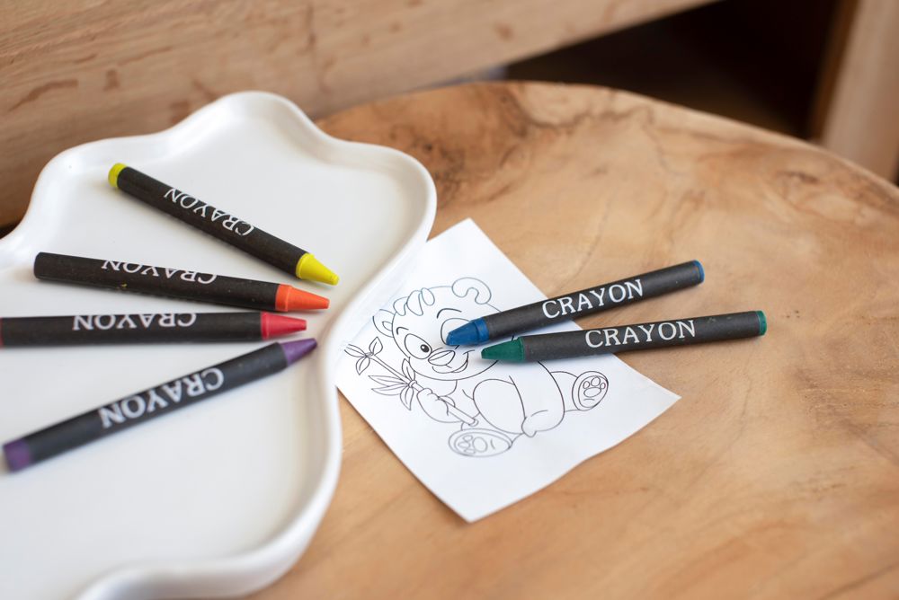 Cardboard box with crayons Selena